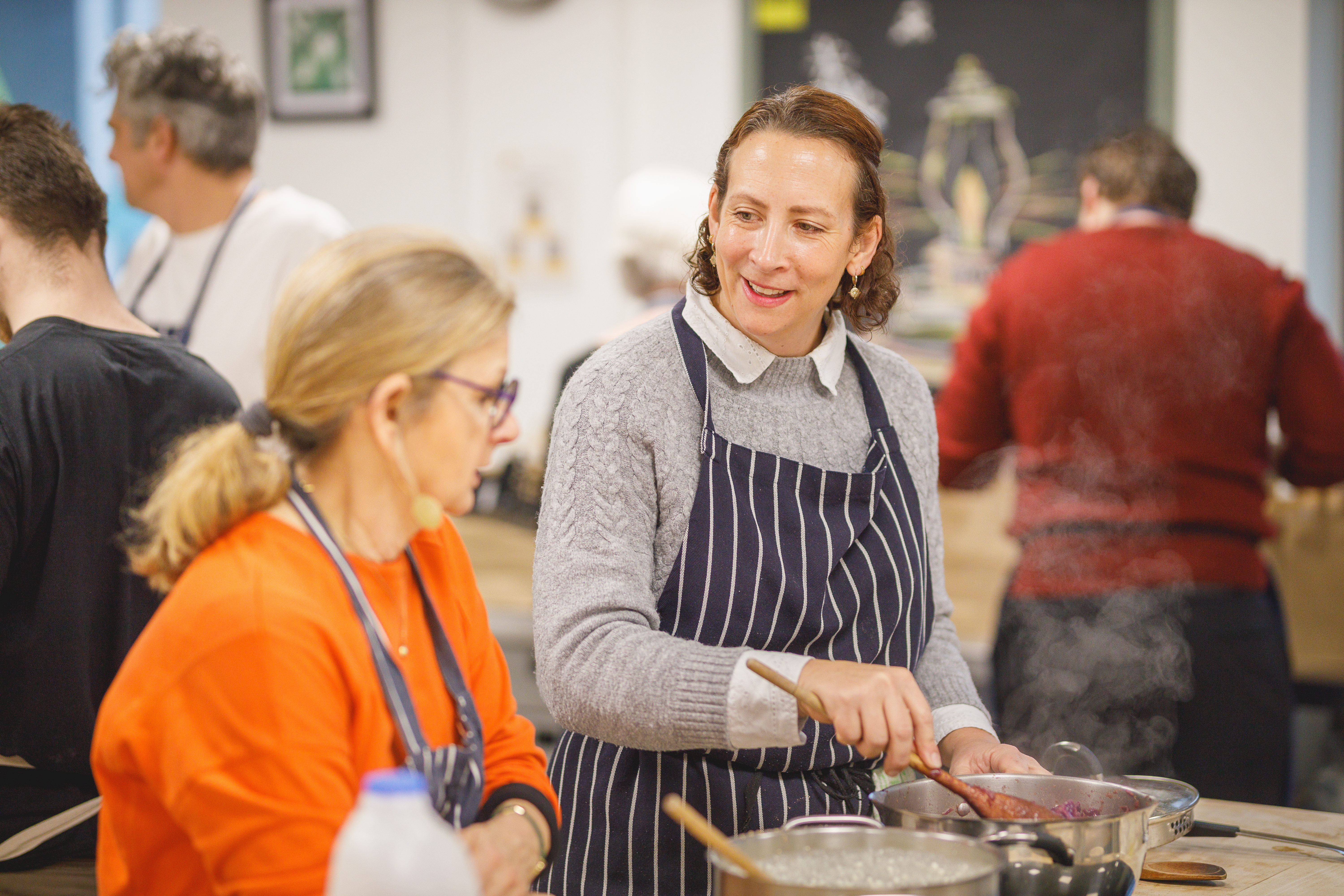 Two people cooking together.jpg