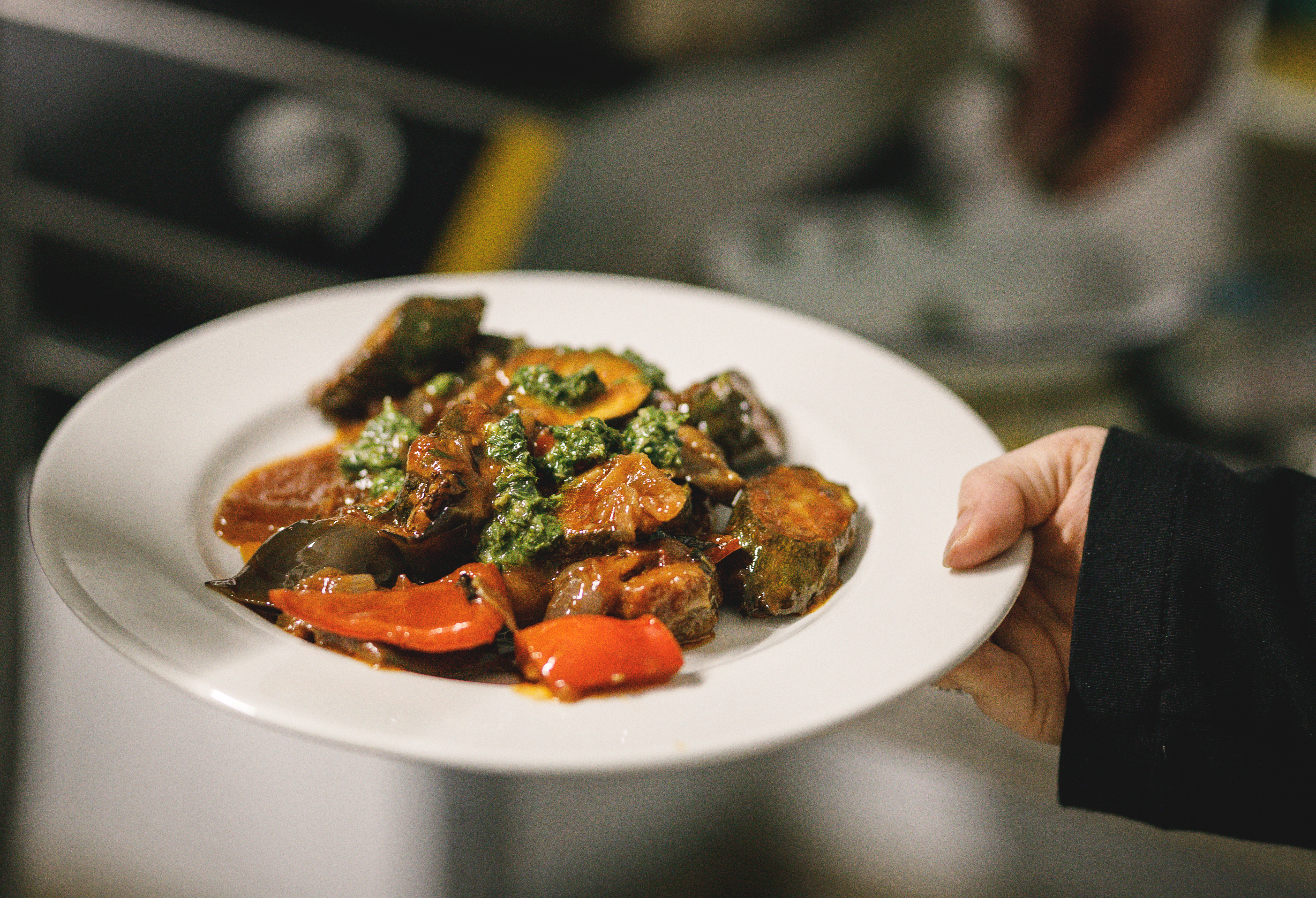 a bowl of courgette curry with peppers 2